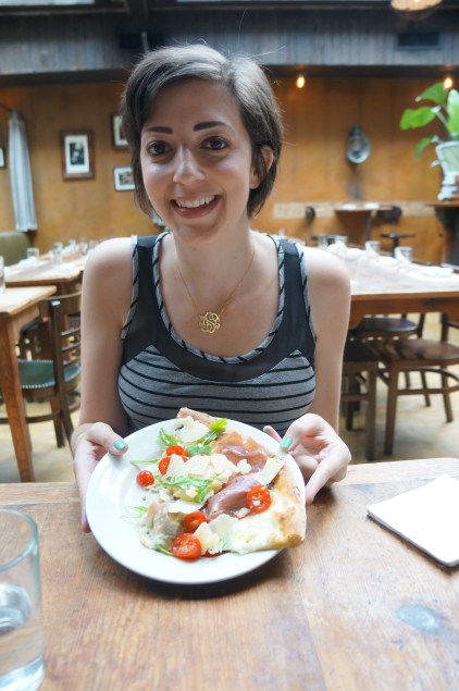 Very happy to be eating pizza for breakfast.