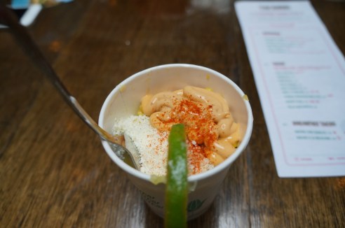 Fourth taste: toasted corn with lime, cotija cheese and spices.